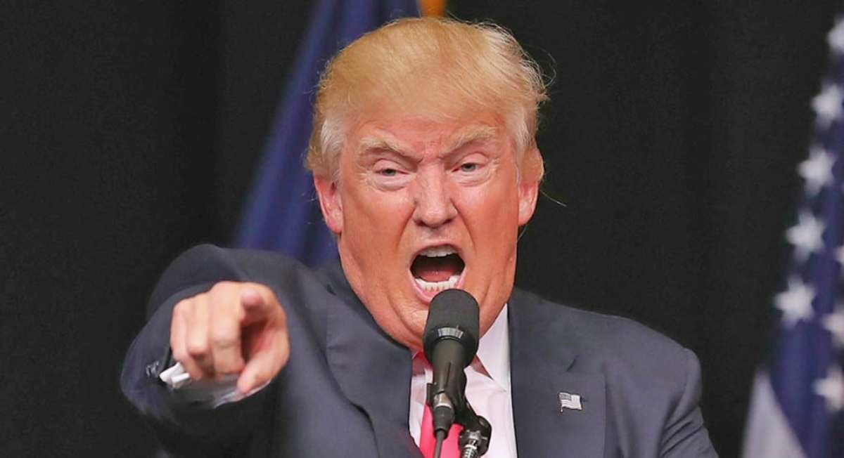 Trump Angry and pointing from podium